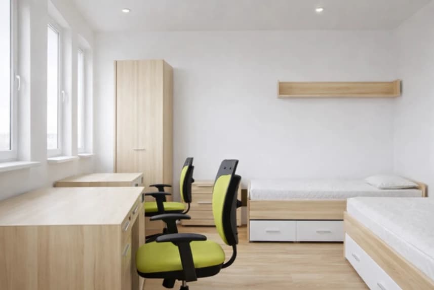 Program „Dom dla Absolwenta” 2026. Nabór wniosków Pokój z dwoma łóżkami i biurkami.